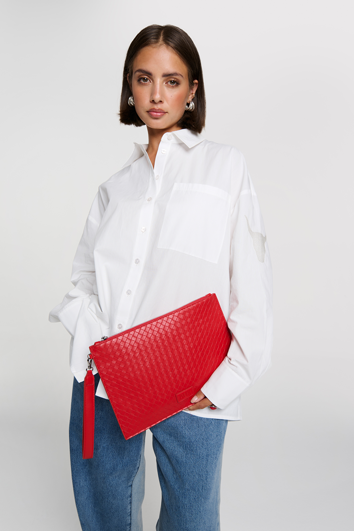 Braided clutch alix the label