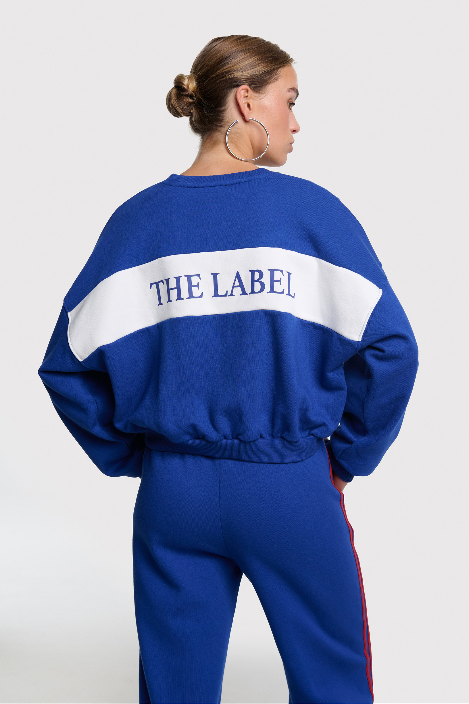 ladies knitted logo tape sweater alix the label